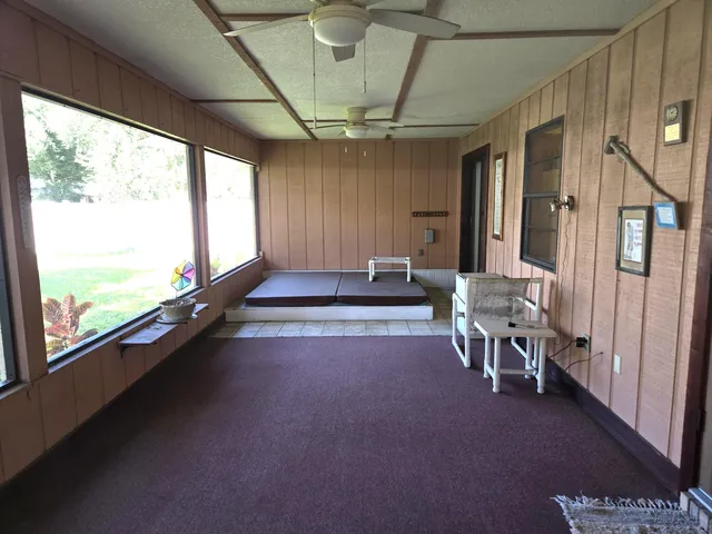 a room with furniture and a window