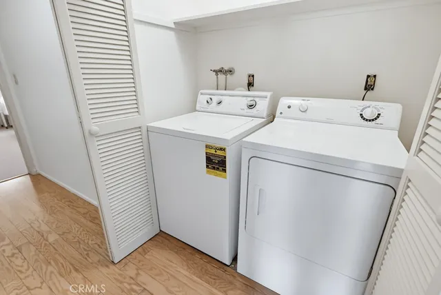 a view of a backyard with swimming pool