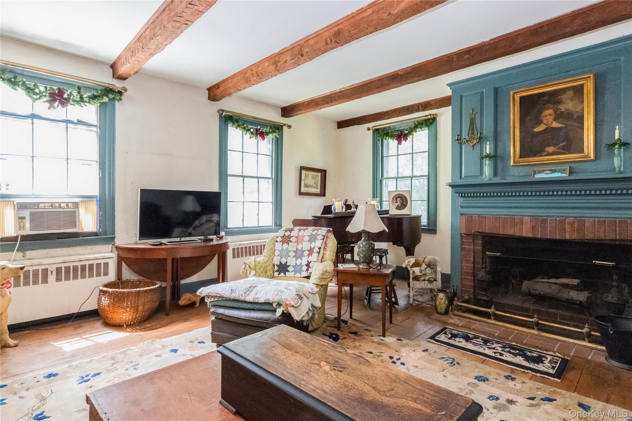 93 Widmer Road Wappingers Falls, NY 12590 - Photo 16 of 45 Living Room, with fireplace, wideboard flrs. beamed ceiling