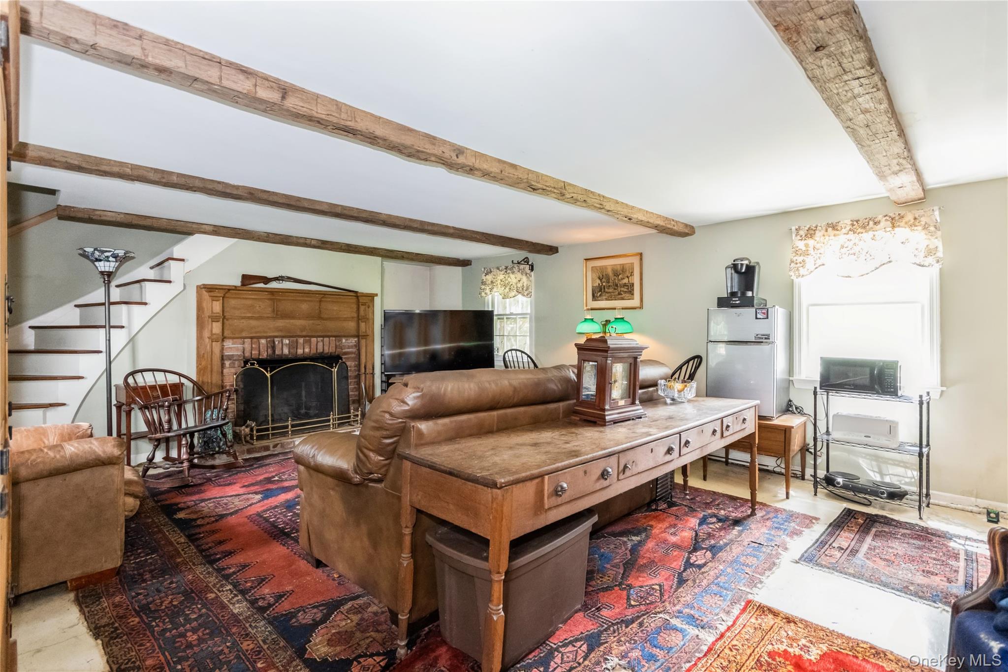 93 Widmer Road Wappingers Falls, NY 12590 - Photo 22 of 45 Could be part of the ensuite wing, fireplace, laundry area