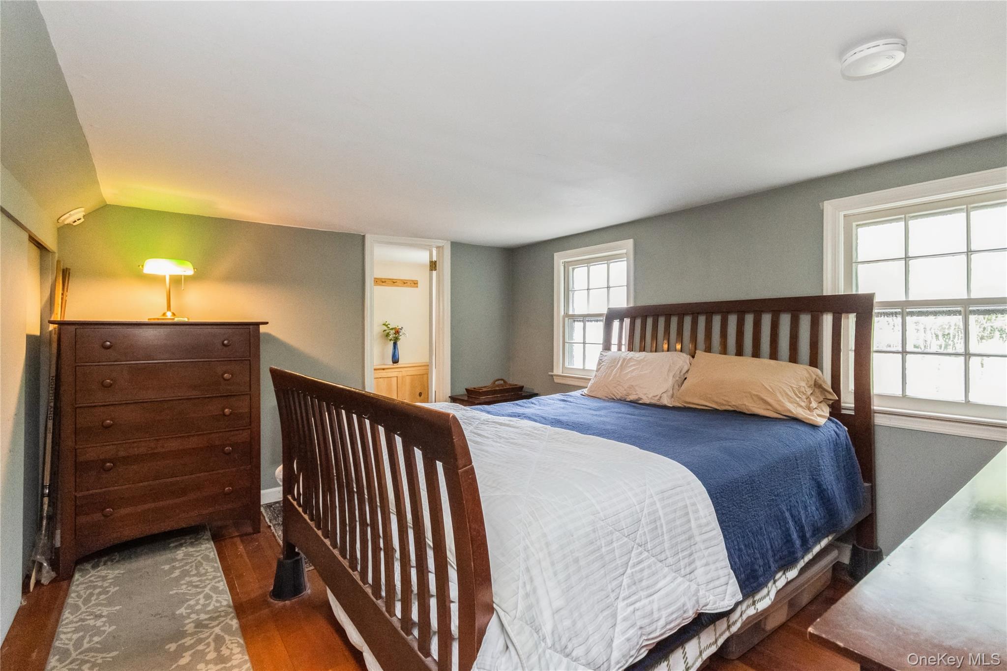 93 Widmer Road Wappingers Falls, NY 12590 - Photo 25 of 45 Ensuite wing Bedroom with wood finished floors, full bath