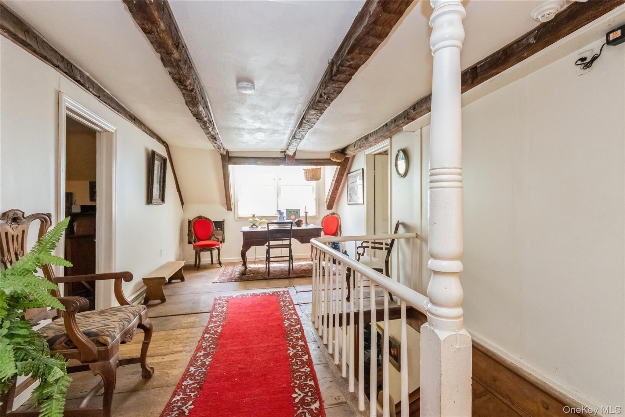 93 Widmer Road Wappingers Falls, NY 12590 - Photo 27 of 45 Upstairs Hall featuring baseboards and beamed ceiling