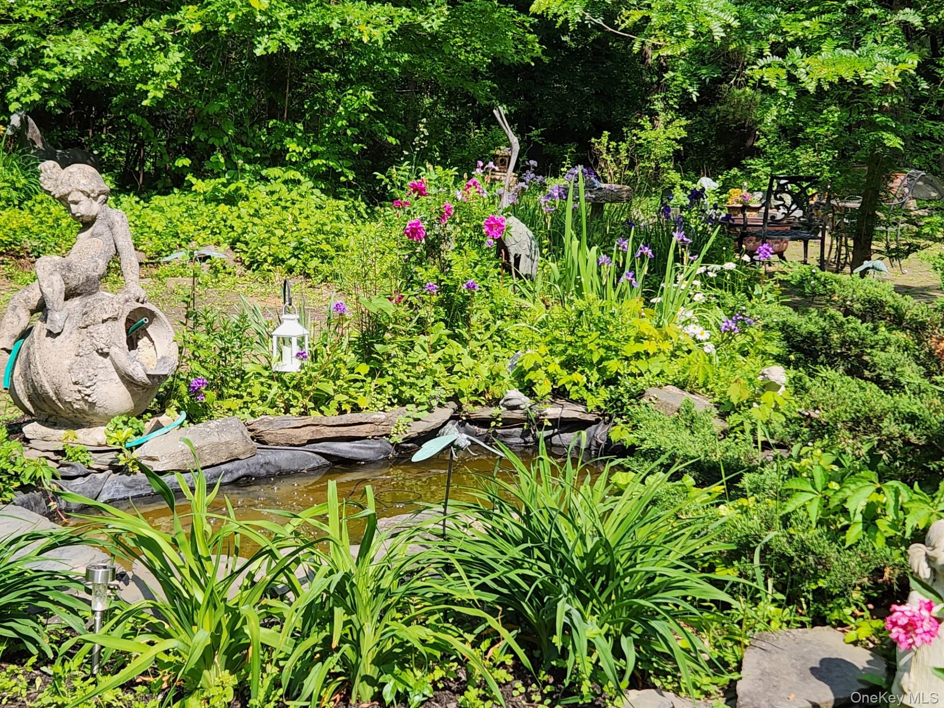 93 Widmer Road Wappingers Falls, NY 12590 - Photo 37 of 45 Small pond by patio area