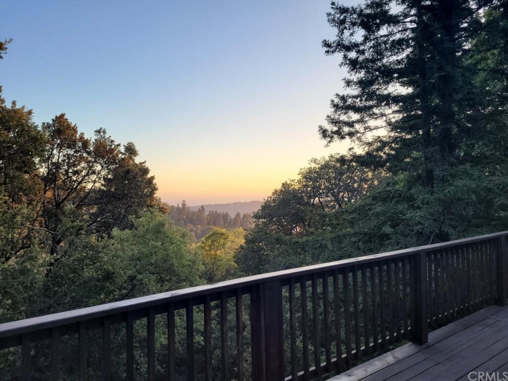 582 Sunset View Road Twin Peaks, CA 92391 - Photo 15 of 18 a balcony with an outdoor space