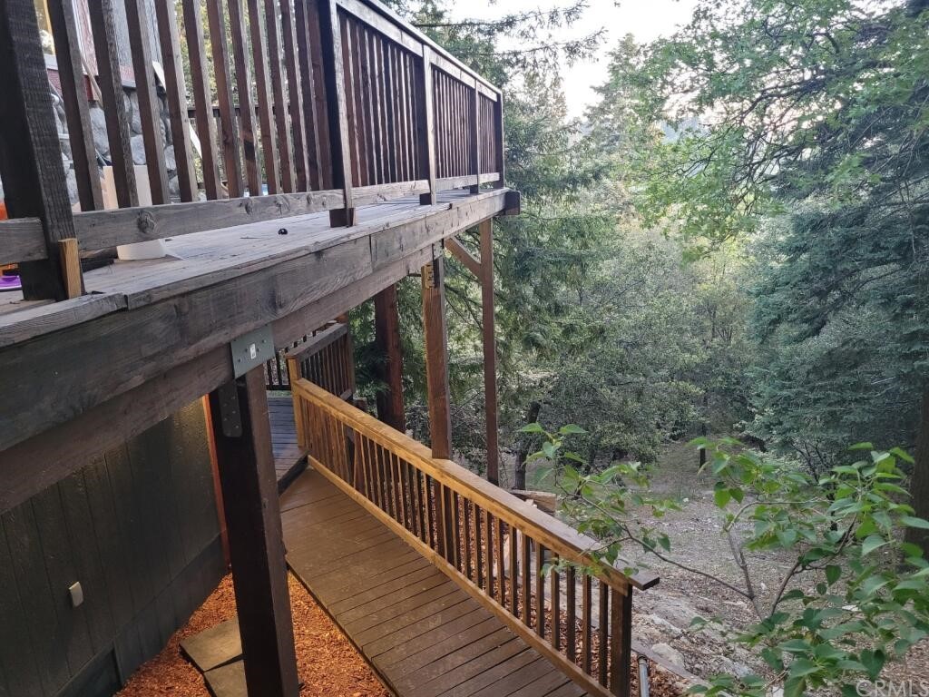 582 Sunset View Road Twin Peaks, CA 92391 - Photo 18 of 18 a view of a balcony with wooden fence