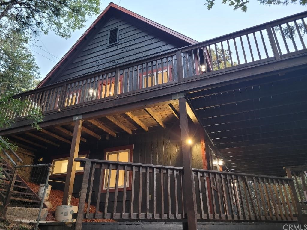 582 Sunset View Road Twin Peaks, CA 92391 - Photo 4 of 18 a view of porch with wooden floor