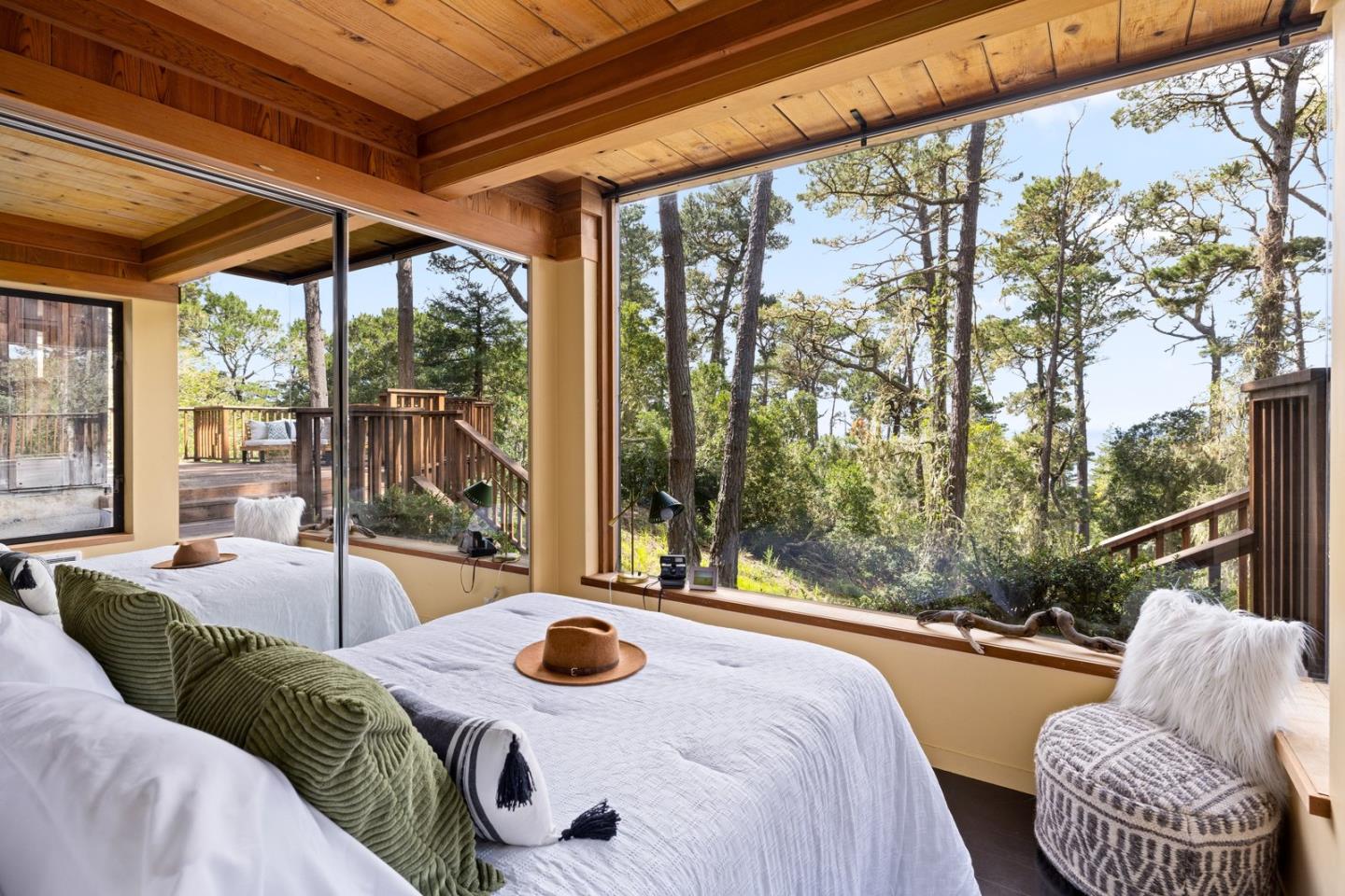73 Mt Devon Road Carmel Highlands, CA 93923 - Photo 78 of 88 a bedroom with furniture and a large window