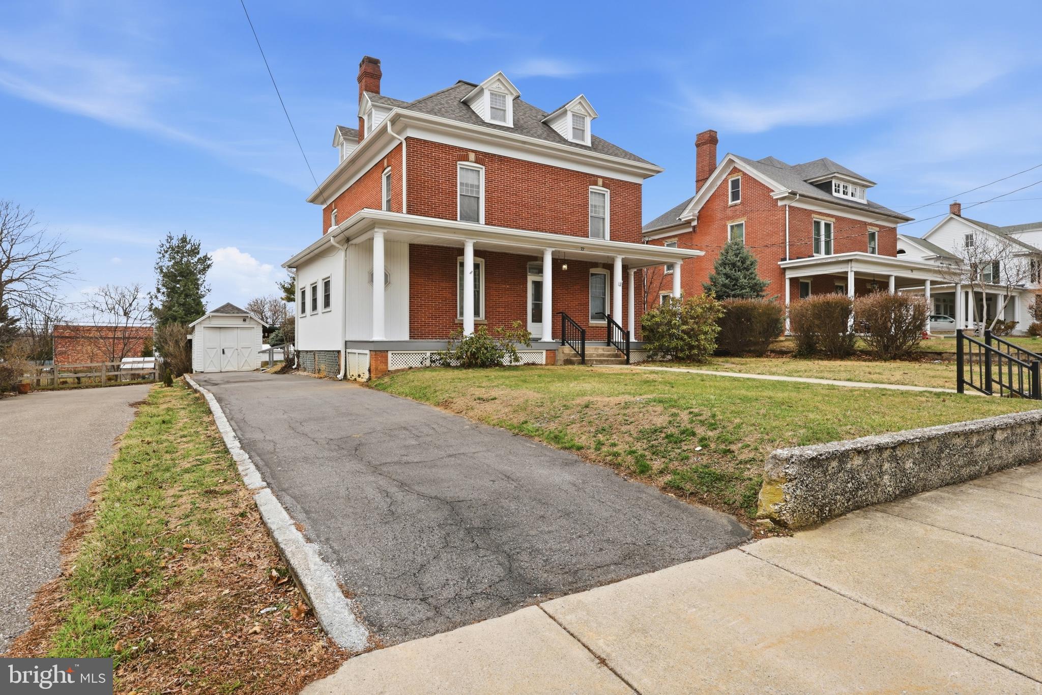 72 South Main Street Smithsburg, MD 21783 - Photo 6 of 48 a front view of a house with a yard