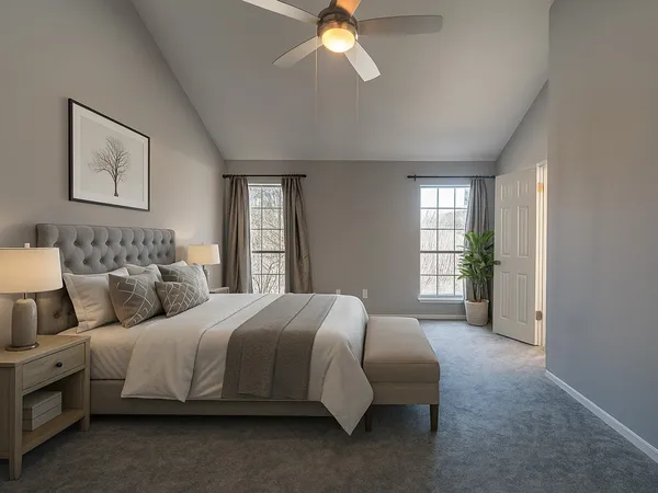 a bedroom with bed and window