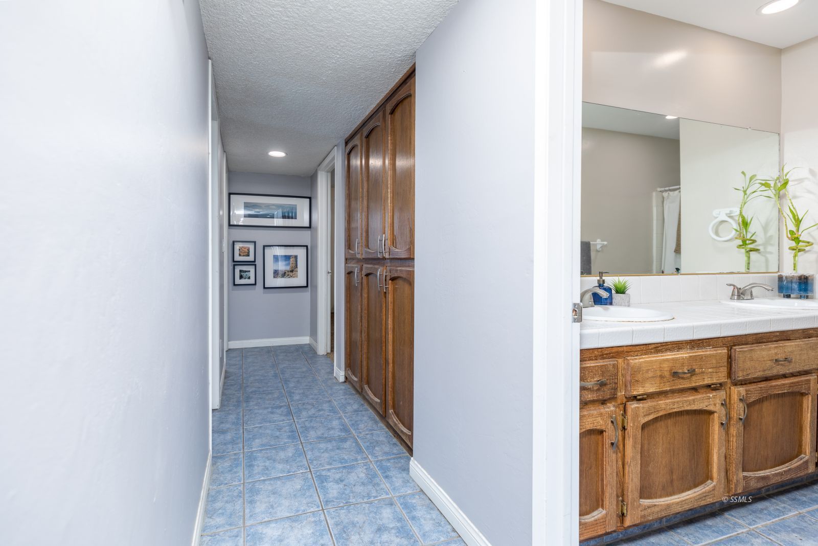 331 Henry Street Ridgecrest, CA 93555 - Photo 12 of 30 a bathroom with a sink and a mirror