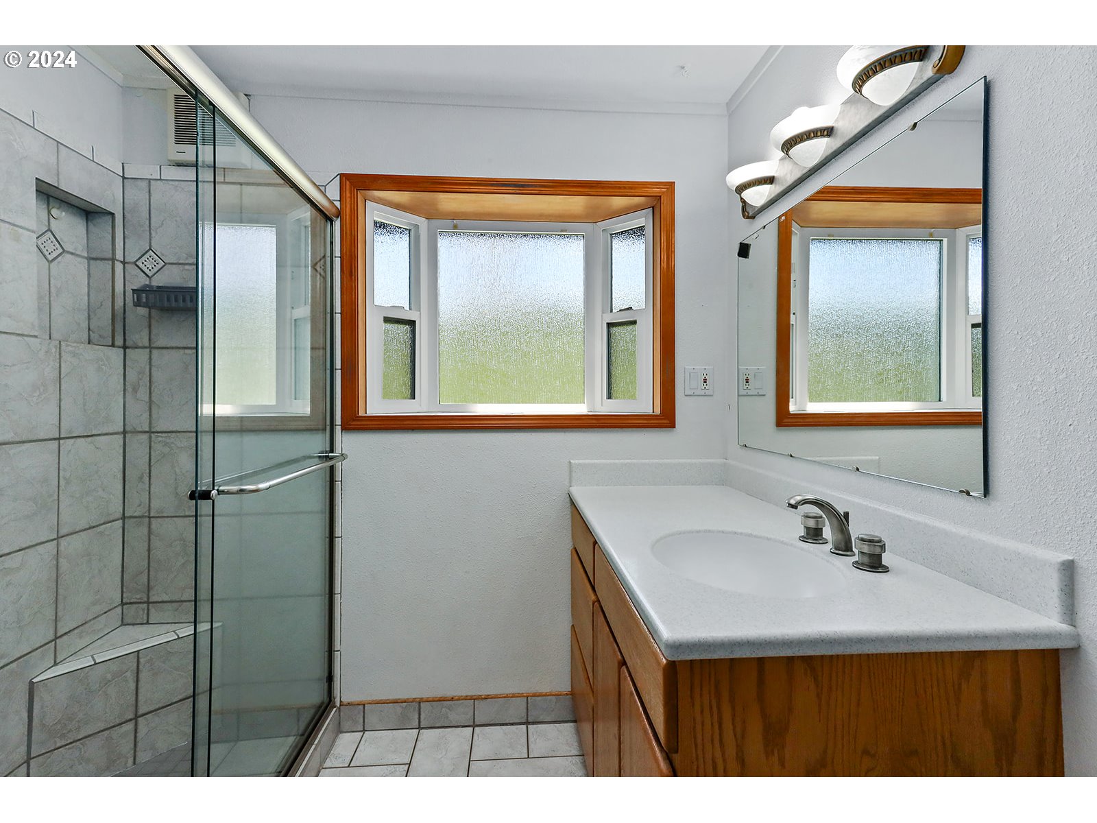 1465 Tucker Road Hood River, OR 97031 - Photo 15 of 48 a bathroom with a sink and a mirror