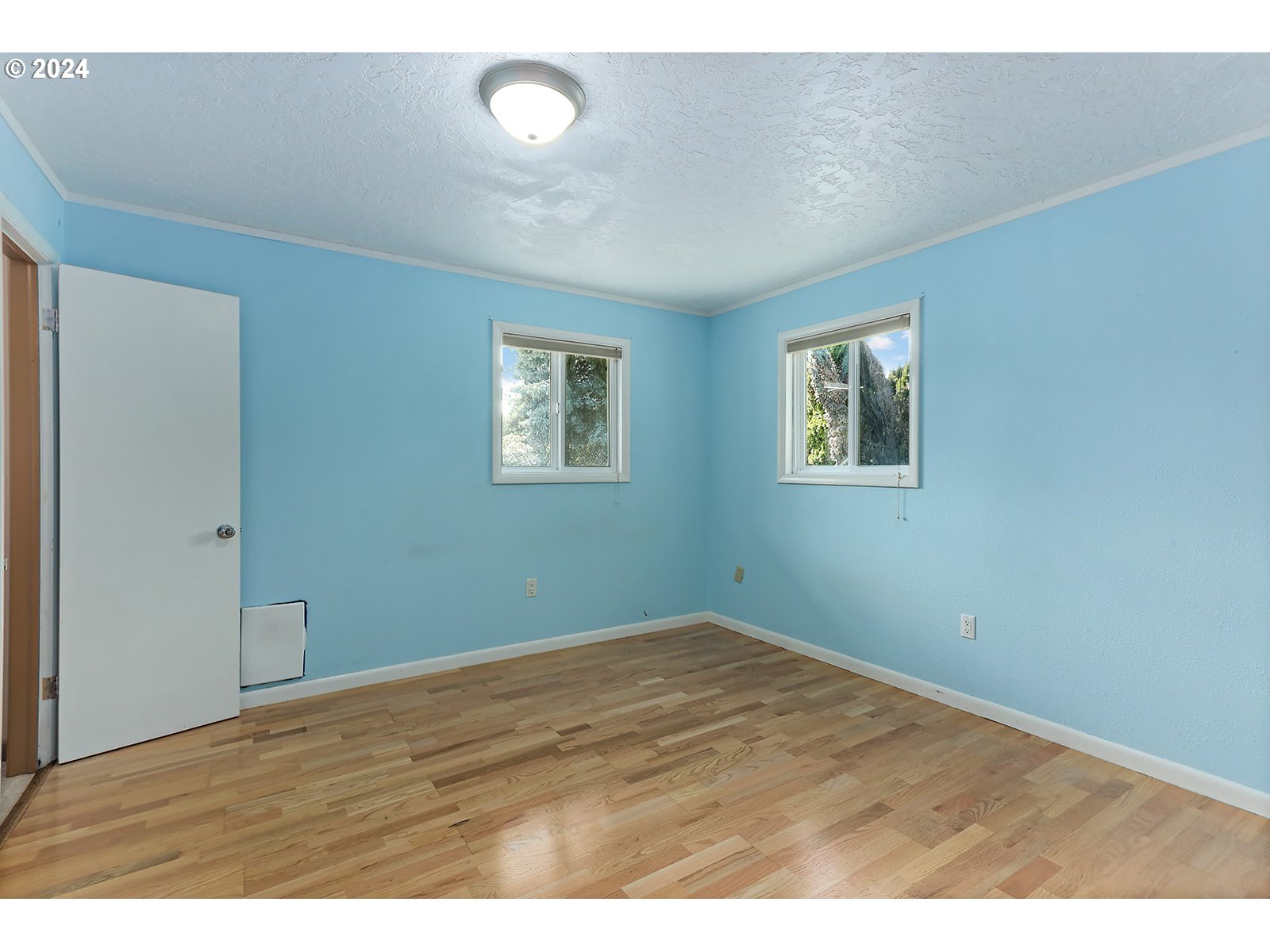 1465 Tucker Road Hood River, OR 97031 - Photo 16 of 48 a view of empty room with wooden floor