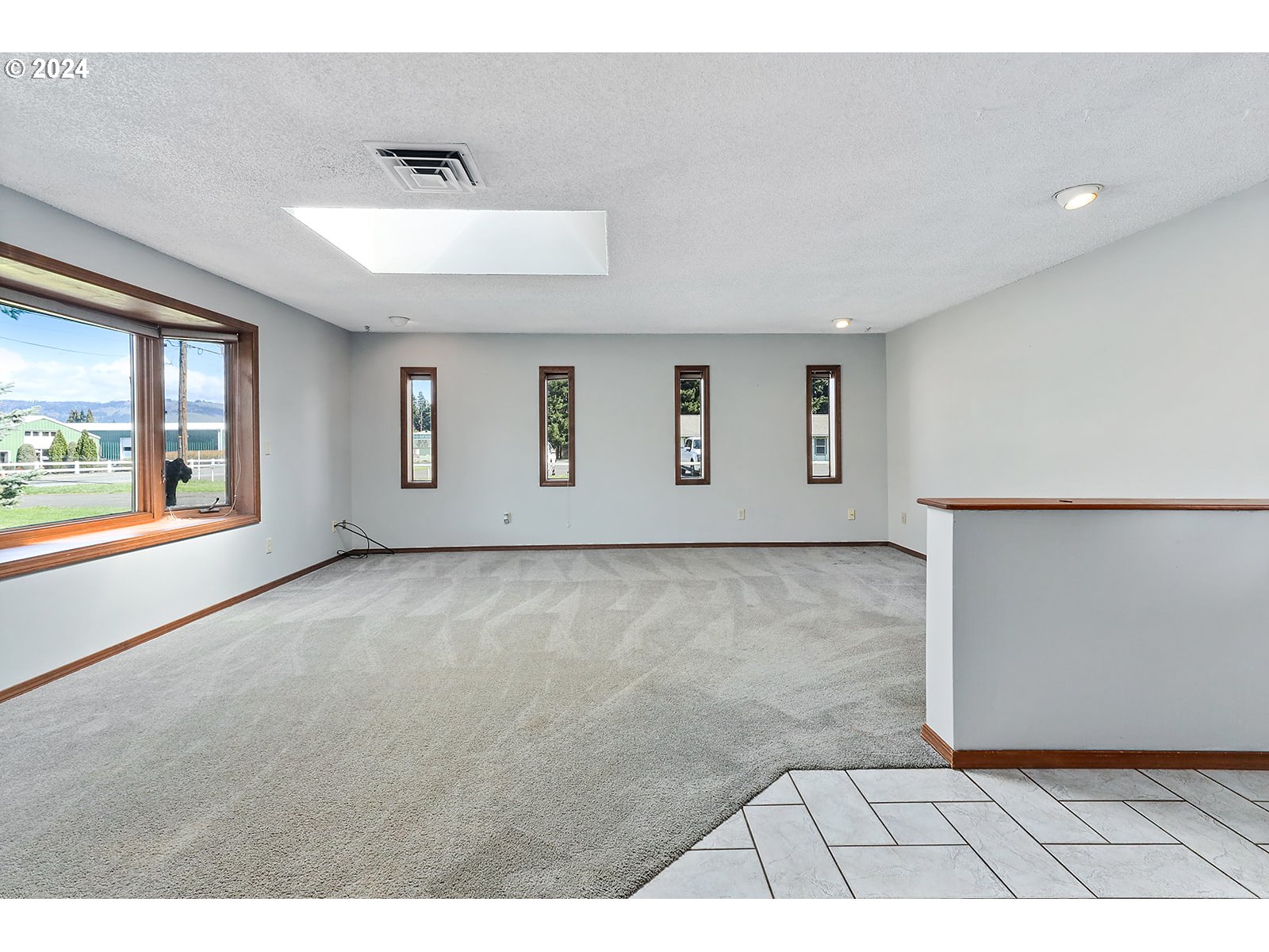 1465 Tucker Road Hood River, OR 97031 - Photo 23 of 48 a view of an empty room with a window