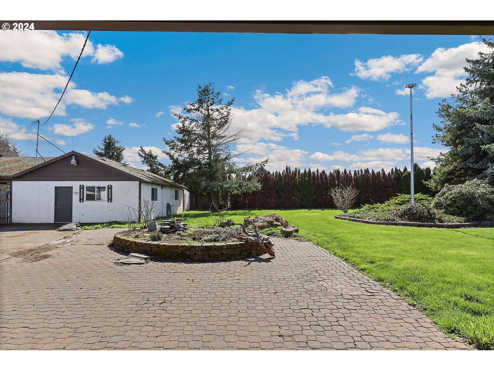 1465 Tucker Road Hood River, OR 97031 - Photo 34 of 48 a front view of a house with a yard