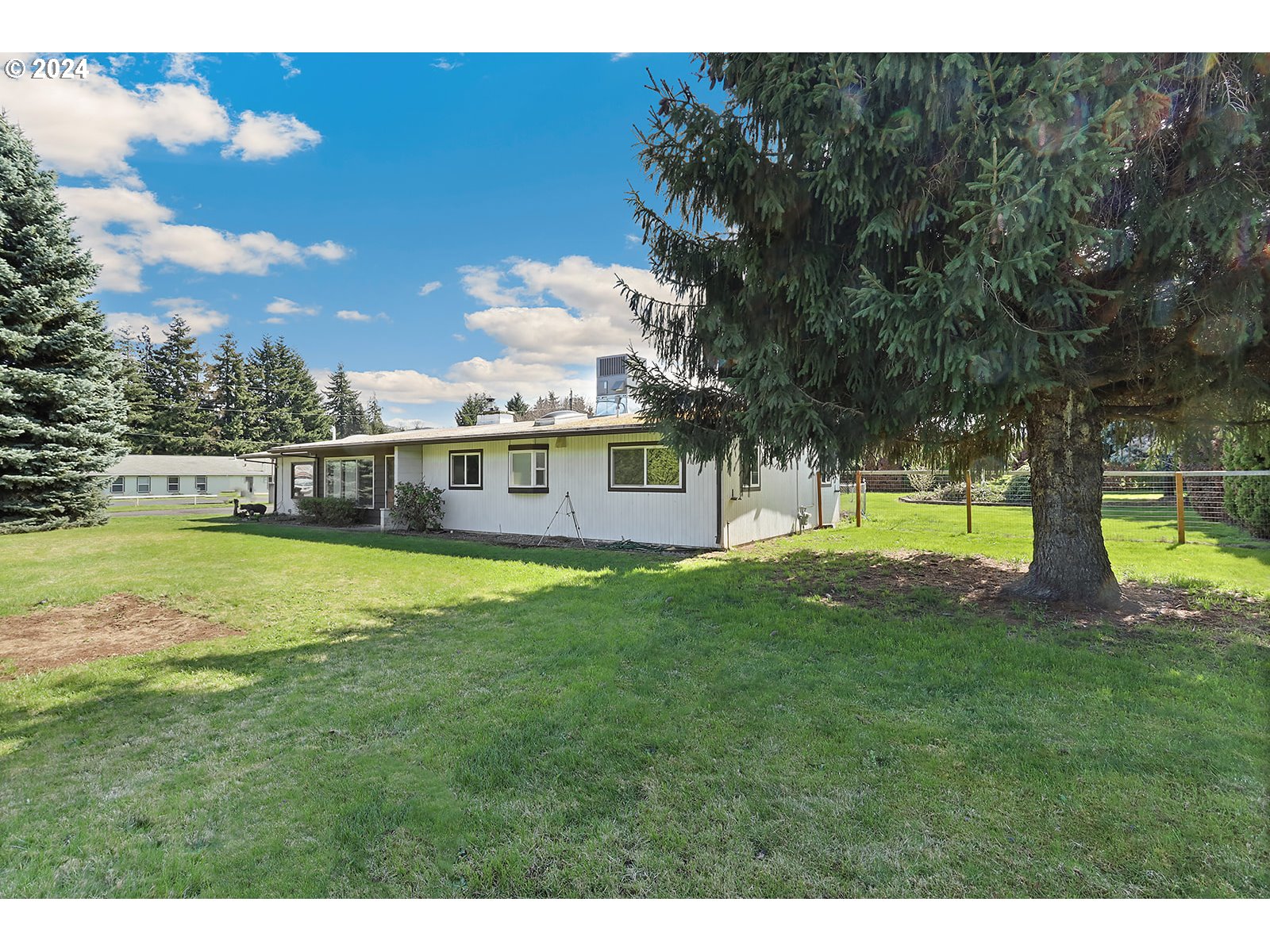 1465 Tucker Road Hood River, OR 97031 - Photo 37 of 48 a view of a house with a big yard