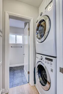 a view of washer and dryer in a utility room