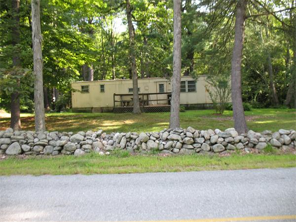 170 Wilsonville Road Thompson, CT 06255 - Photo 1 of 5 a view of a house with a garden and trees