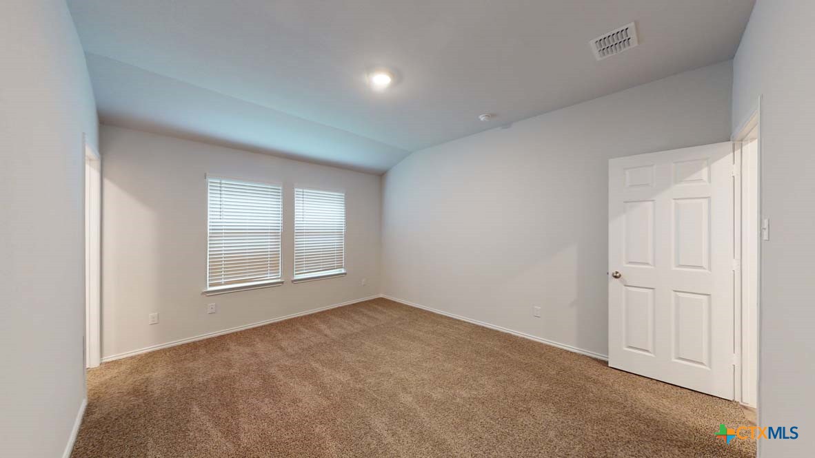 553 Hector Loop Georgetown, TX 78626 - Photo 9 of 21 an empty room with windows