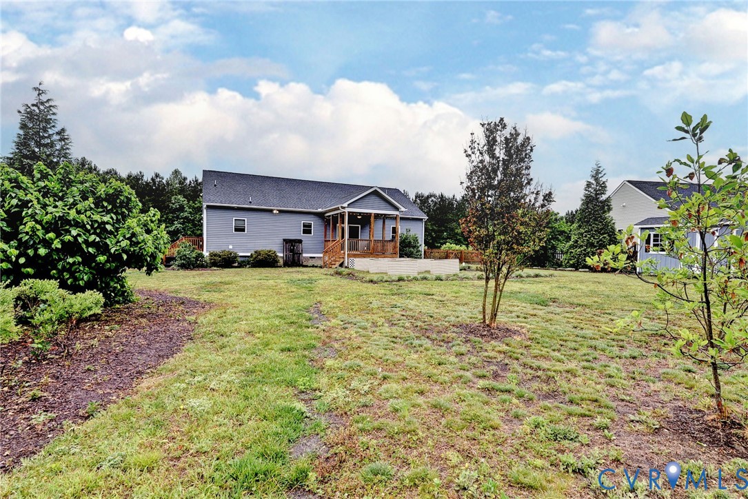 8904 Rock Cedar Road New Kent, VA 23124 - Photo 31 of 37 a house view with swimming pool and garden