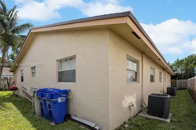 a car parked in front of a house