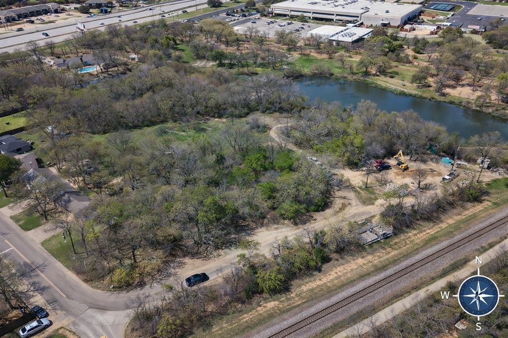 Tbd Burl Street Corinth, TX 76208 - Photo 11 of 11 a view of a forest from a window