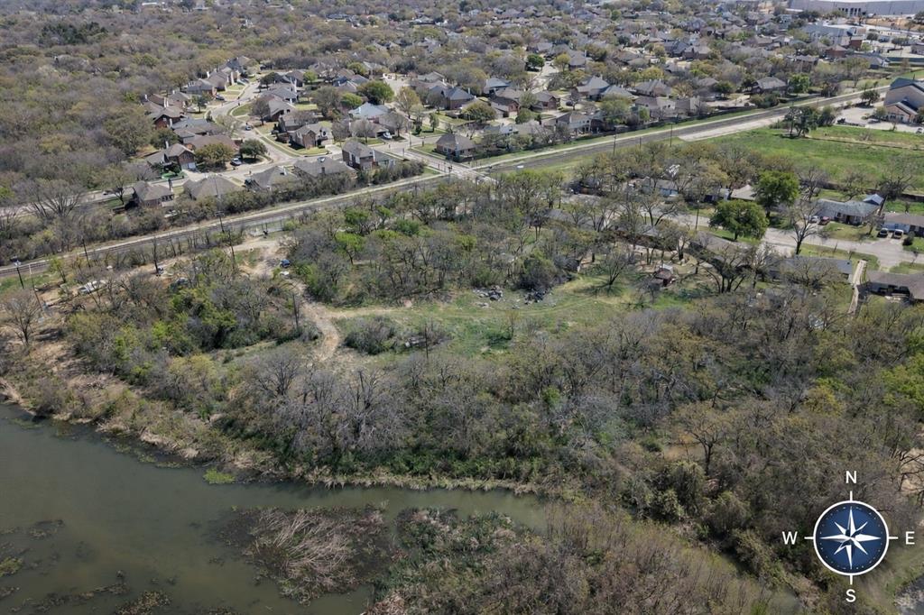 Tbd Burl Street Corinth, TX 76208 - Photo 4 of 11 an aerial view of a house with a yard