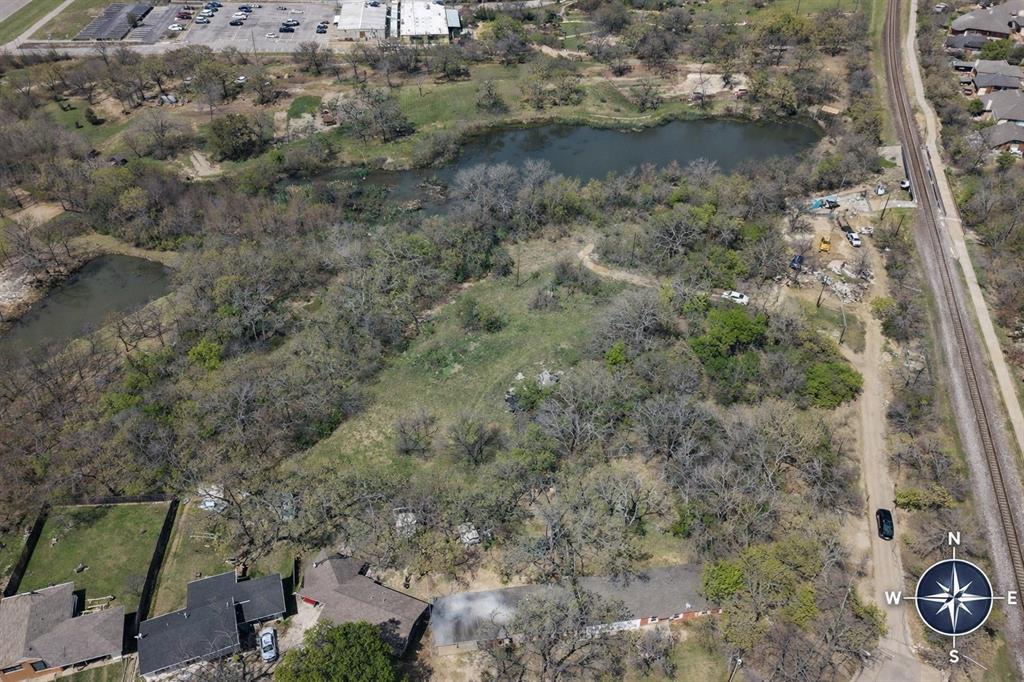 Tbd Burl Street Corinth, TX 76208 - Photo 5 of 11 an aerial view of residential house with outdoor space