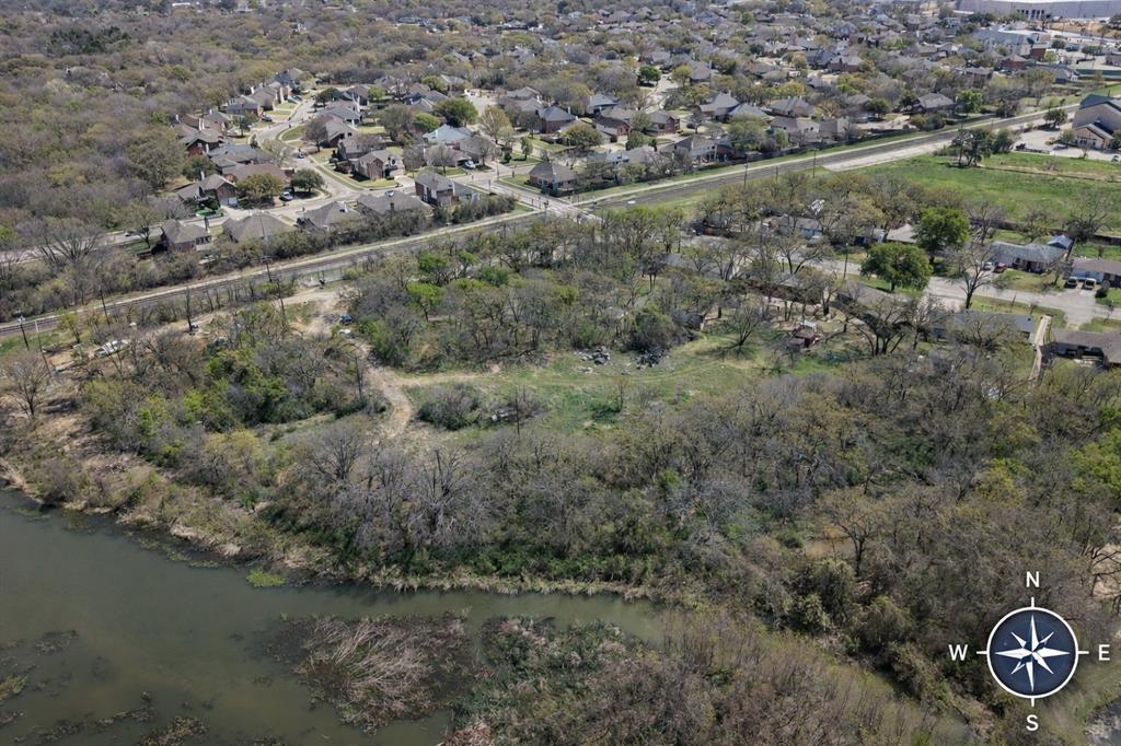 Tbd Burl Street Corinth, TX 76208 - Photo 9 of 11 an aerial view of a house with a yard