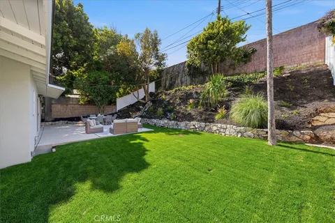 a garden view with a seating space