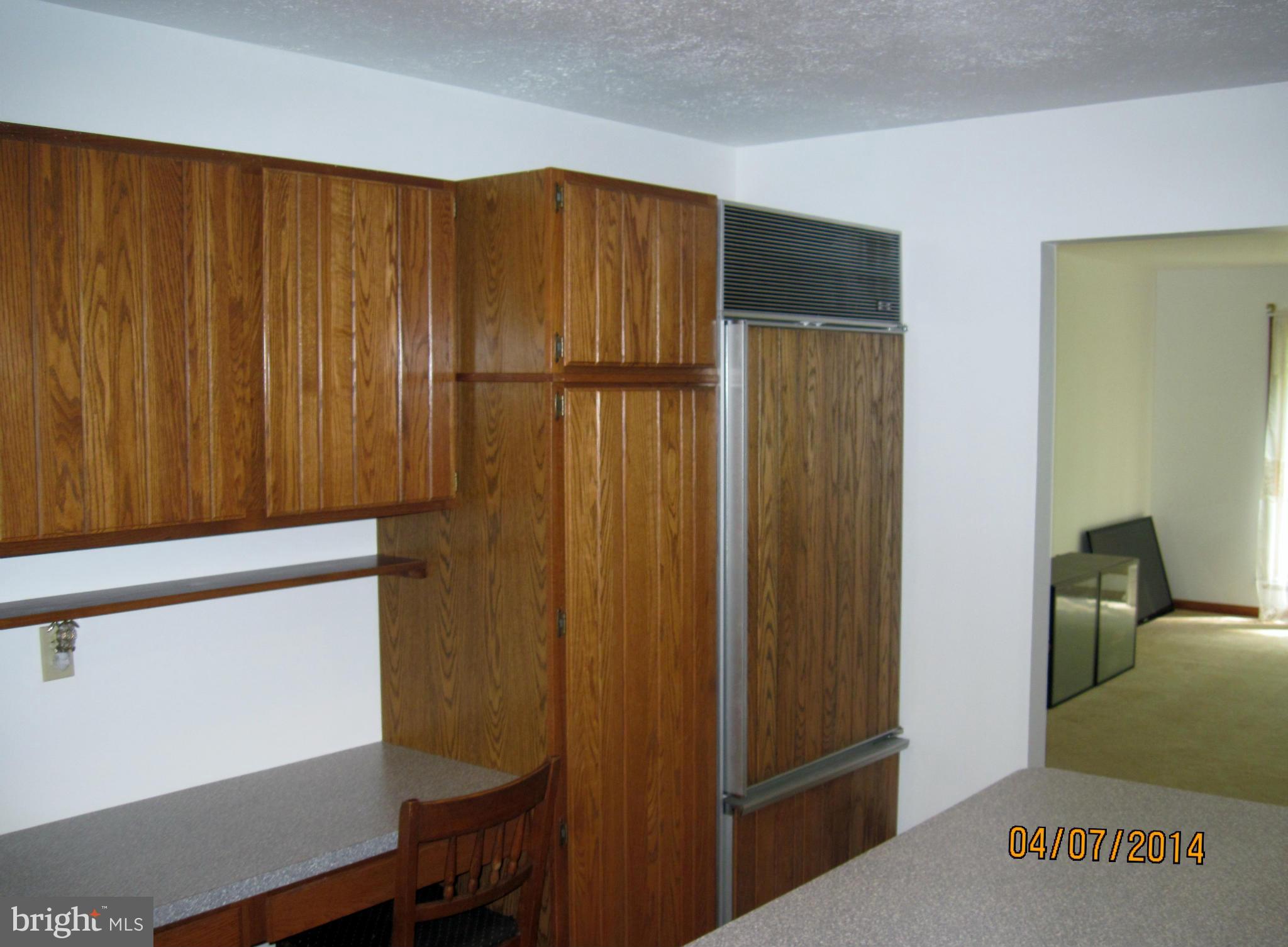 7151 Marshall Road St. Leonard, MD 20685 - Photo 11 of 25 a bathroom with a sink and a chair