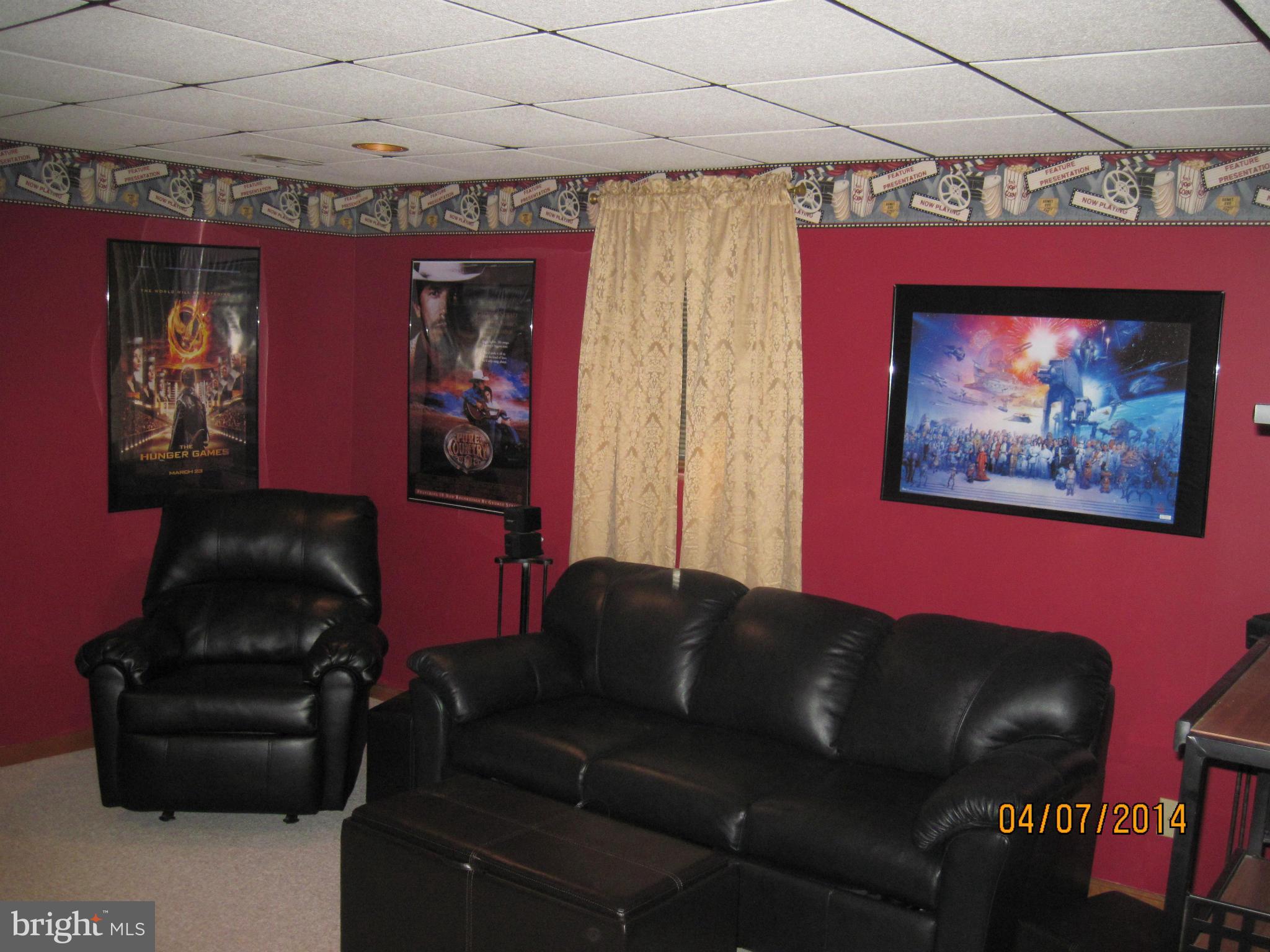 7151 Marshall Road St. Leonard, MD 20685 - Photo 19 of 25 a living room with furniture and a red chair