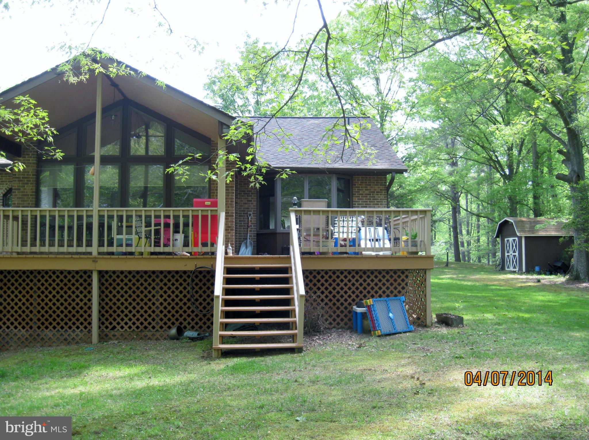 7151 Marshall Road St. Leonard, MD 20685 - Photo 3 of 25 a view of outdoor space yard and deck