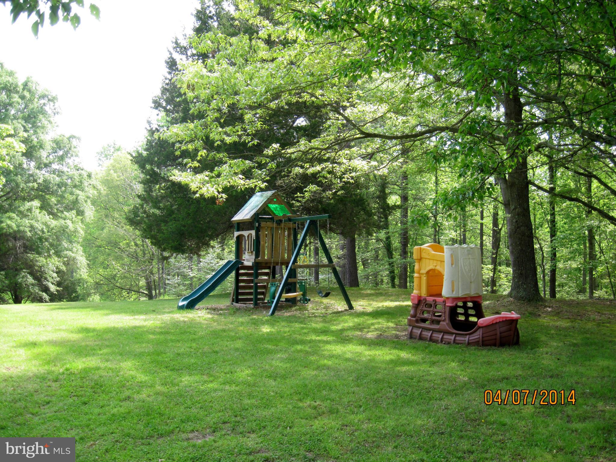 7151 Marshall Road St. Leonard, MD 20685 - Photo 5 of 25 a view of a park with a slide