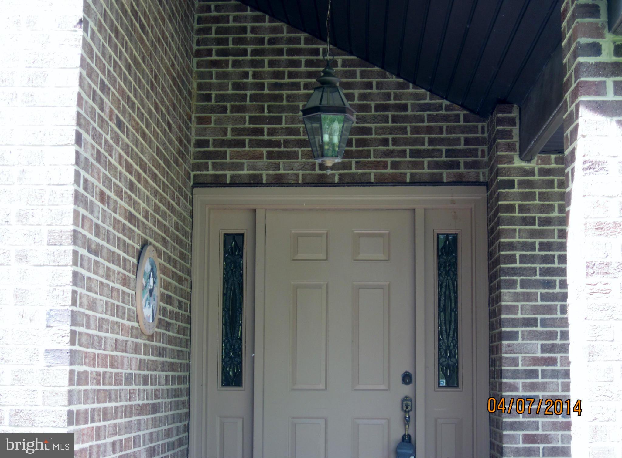 7151 Marshall Road St. Leonard, MD 20685 - Photo 7 of 25 a front view of a house