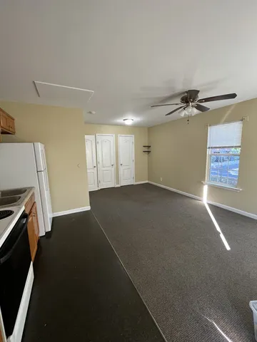 a view of a livingroom with a fireplace