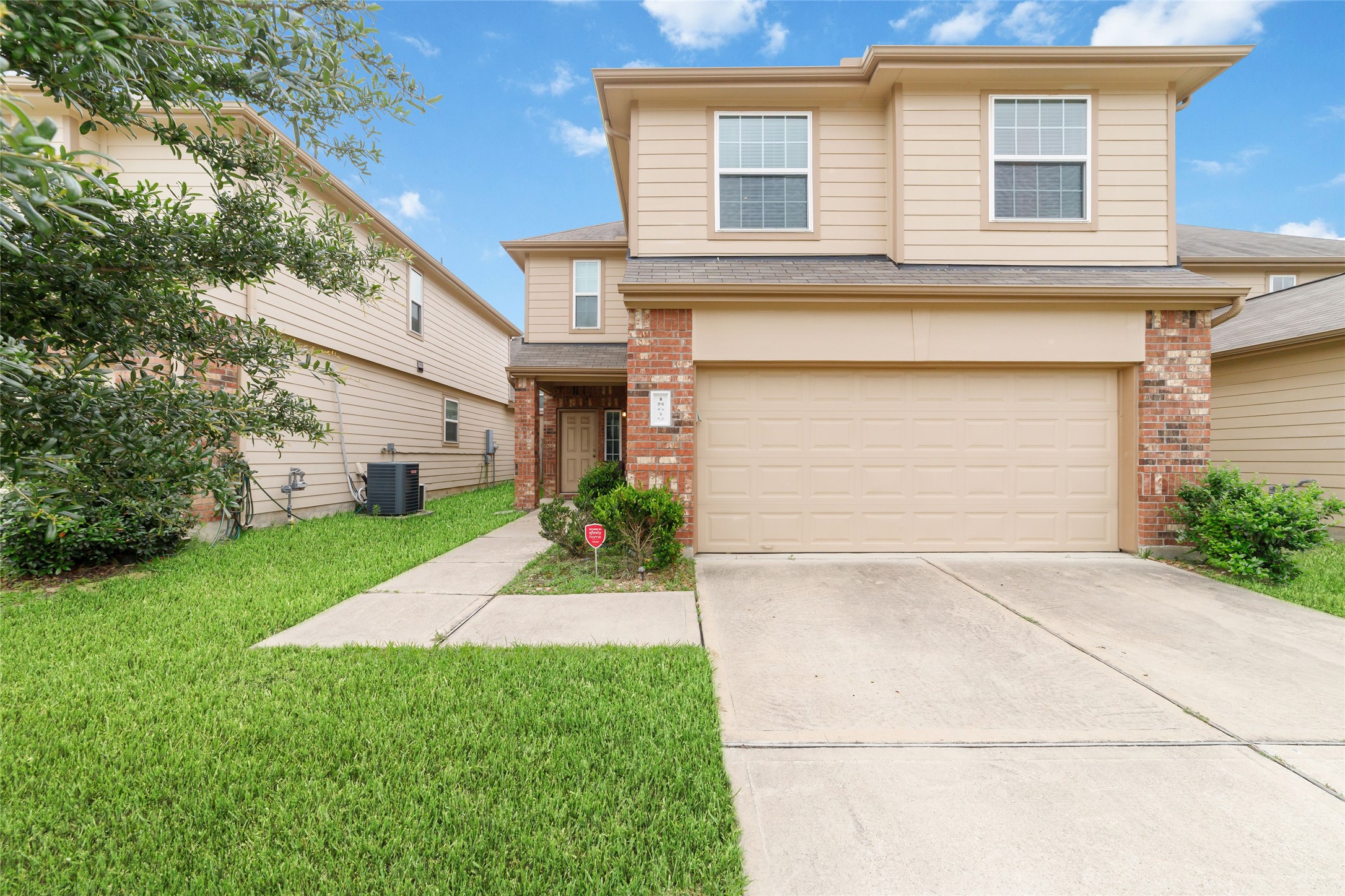 18619 Cooper Ravine Way Katy, TX 77449 - Photo 1 of 23 a front view of house and yard with large trees