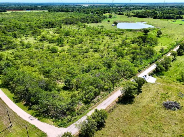 a view of a lush green field