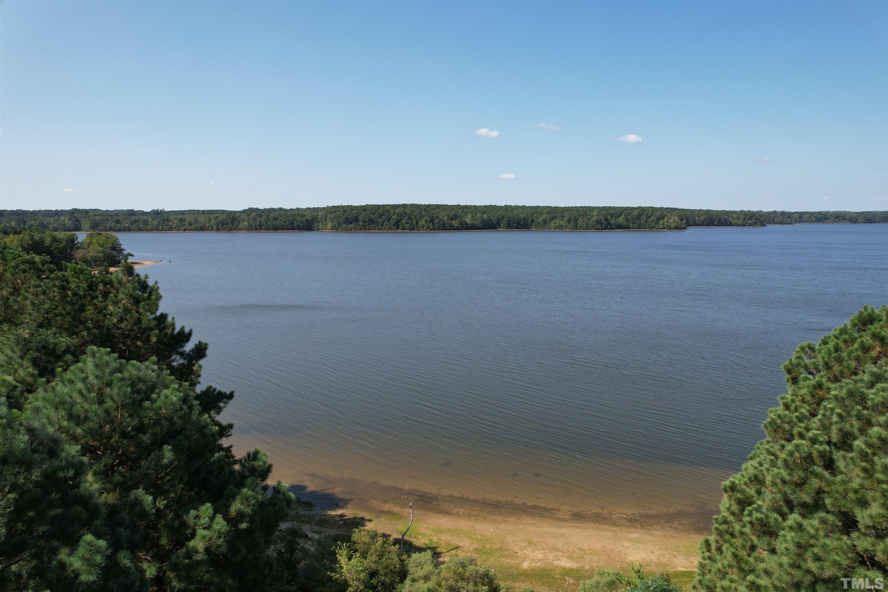 8666 Bailey Road Sims, NC 27880 - Photo 12 of 35 a view of a lake from a yard