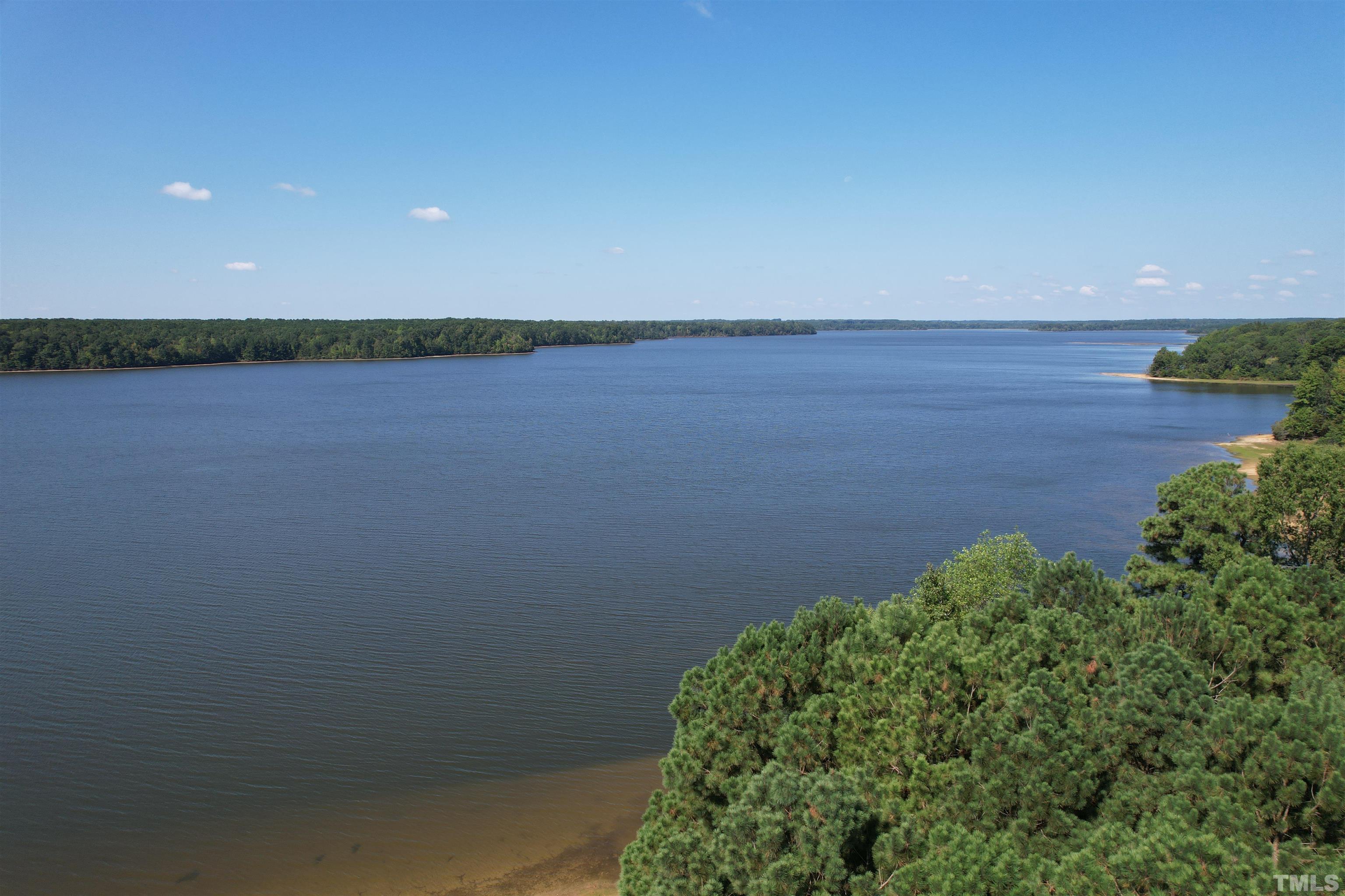 8666 Bailey Road Sims, NC 27880 - Photo 14 of 35 a view of a lake and a yard