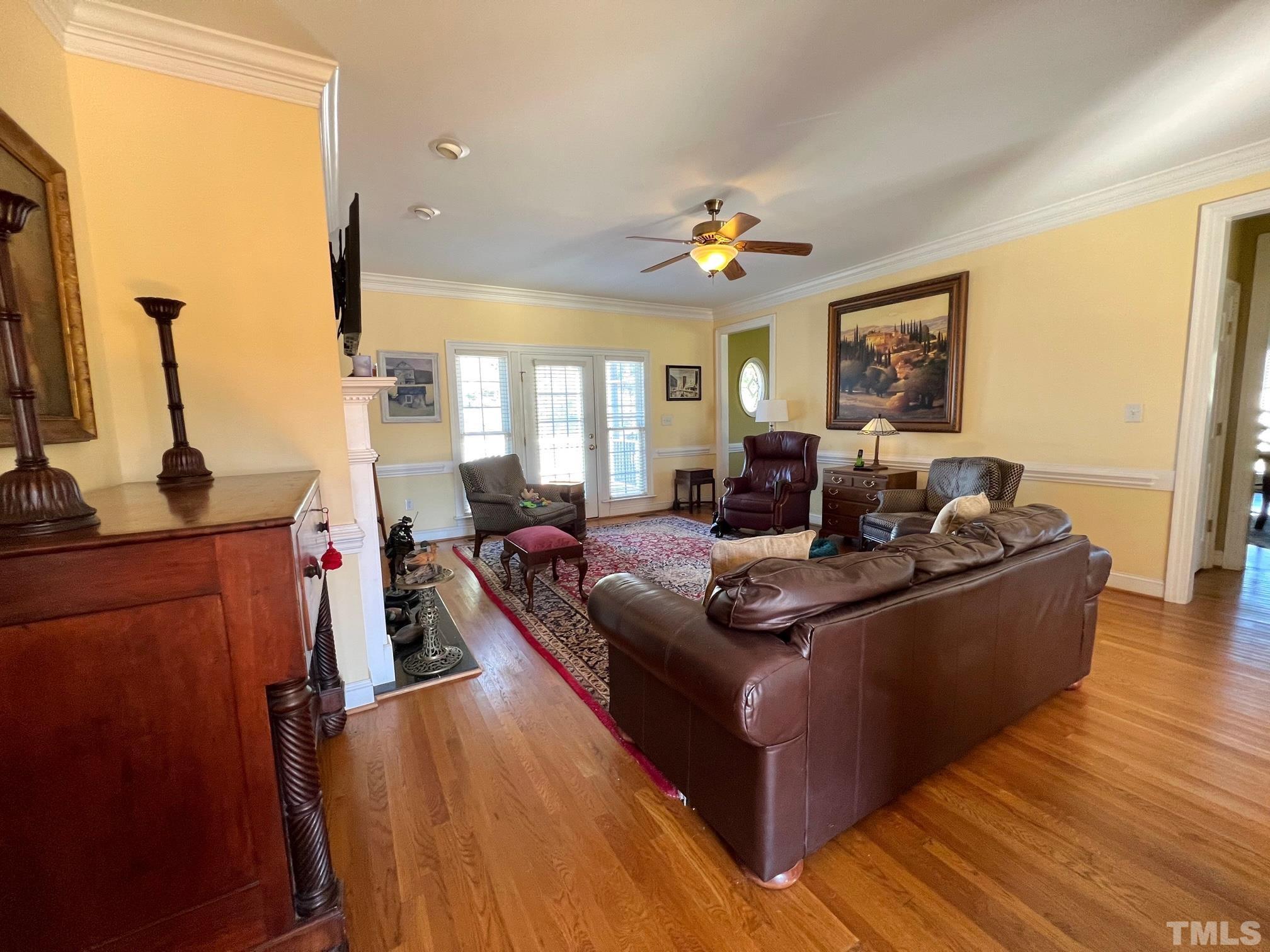 8666 Bailey Road Sims, NC 27880 - Photo 22 of 35 a living room with furniture and a flat screen tv