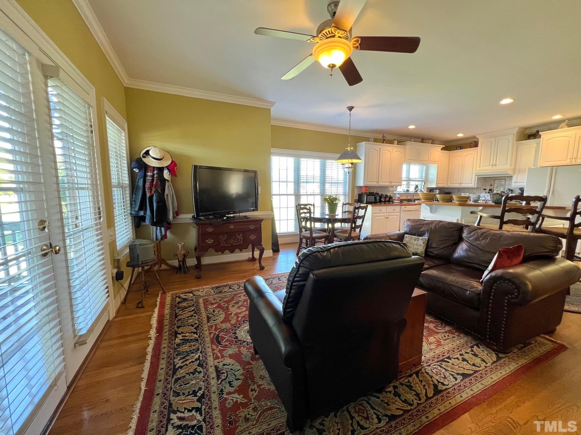 8666 Bailey Road Sims, NC 27880 - Photo 23 of 35 a living room with furniture and a flat screen tv