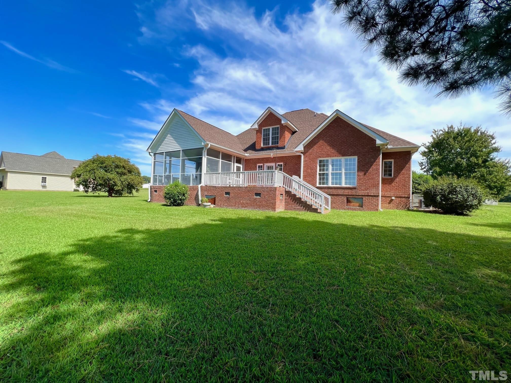 8666 Bailey Road Sims, NC 27880 - Photo 8 of 35 a front view of a house with garden