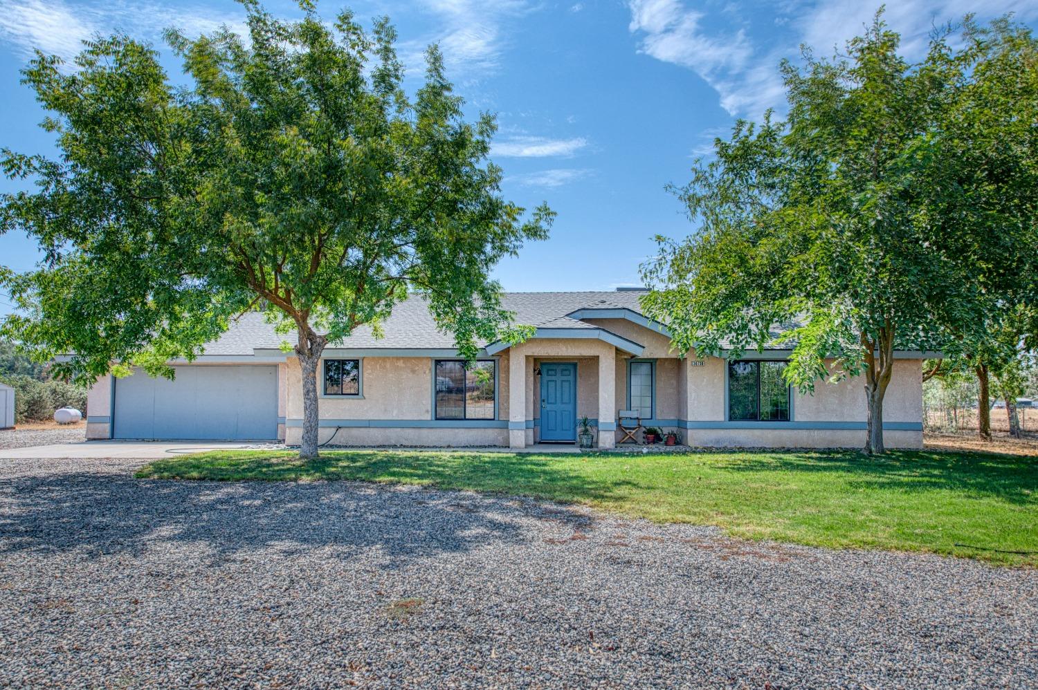 36730 Highway 145 Madera, CA 93636 - Photo 1 of 30 front view of a house with a yard