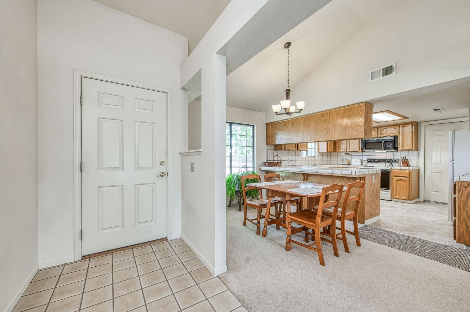 36730 Highway 145 Madera, CA 93636 - Photo 4 of 30 a dining area with furniture and a kitchen view