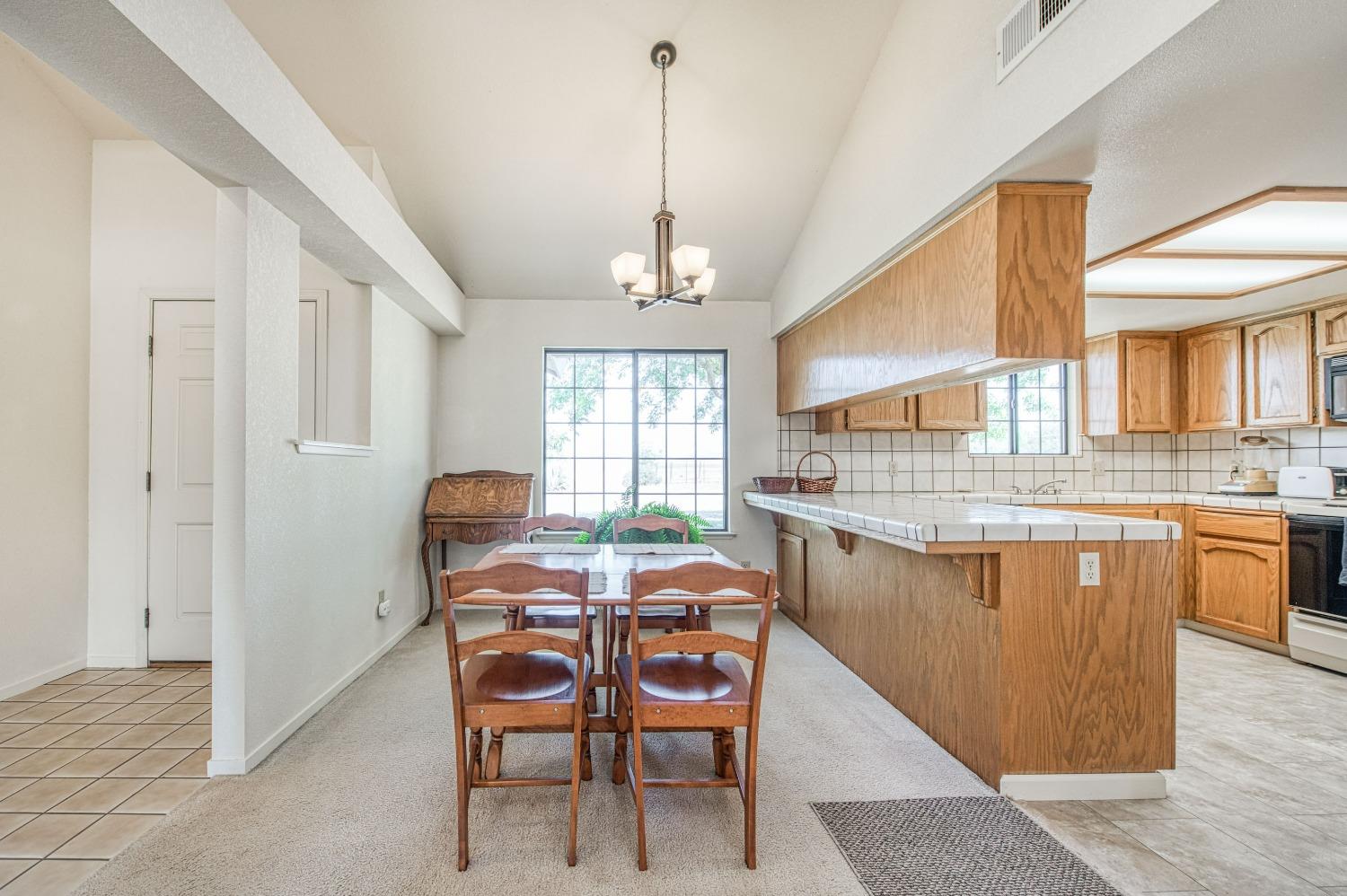36730 Highway 145 Madera, CA 93636 - Photo 5 of 30 a dining room with furniture and window