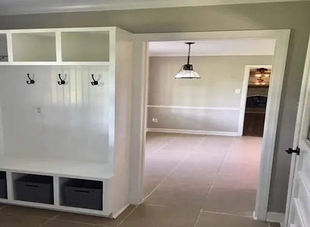 a view of a hallway with a white walls