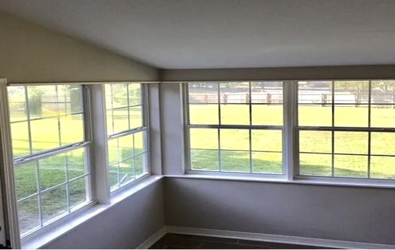 1683 Cedarcrest Cove Germantown, TN 38138 - Photo 7 of 12 a view of an empty room with a window