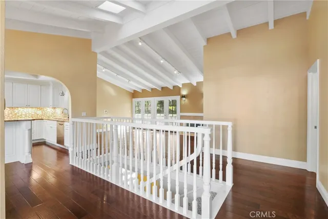 a view of entryway with wooden floor