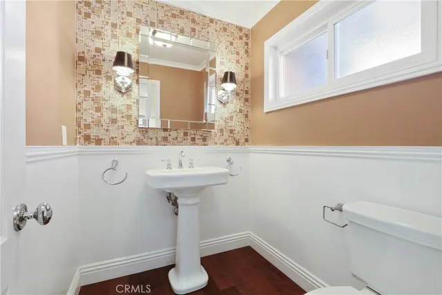a bathroom with a sink and mirror