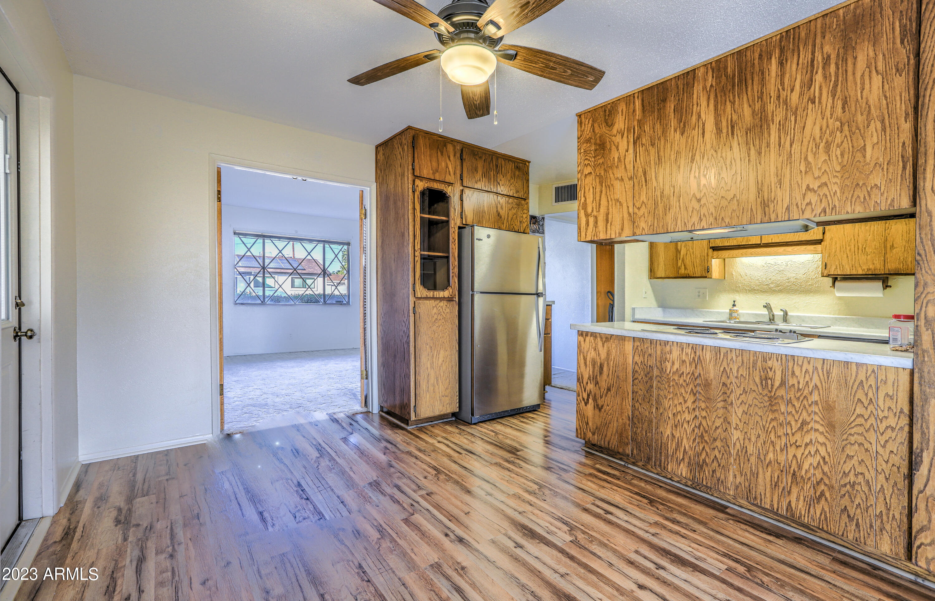 3349 West Charter Oak Road Phoenix, AZ 85029 - Photo 8 of 32 Built-in Cabinetry and View to the Front